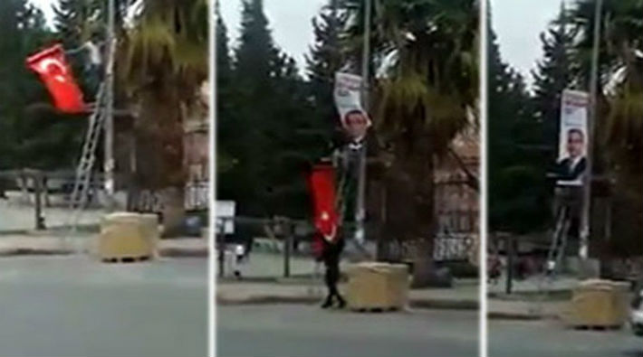 AKP'liler bayrak indirdi, yerine parti afişi astı!